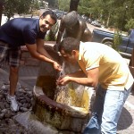 Chris and David drinking from a natural spring in Manitou